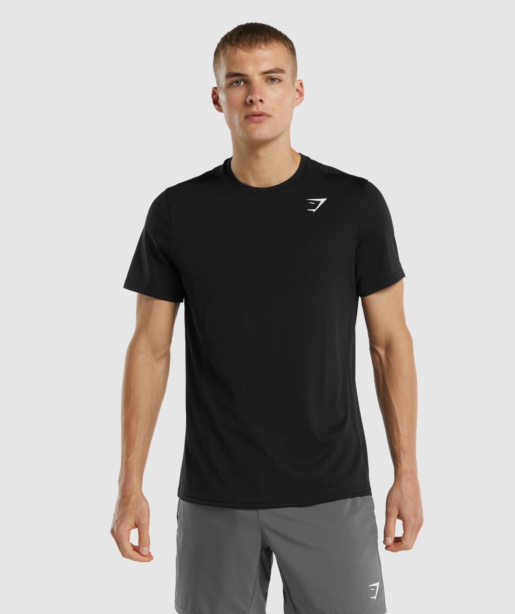 Black Men's Gymshark Arrival Regular Fit T Shirts | FTQHNW-972