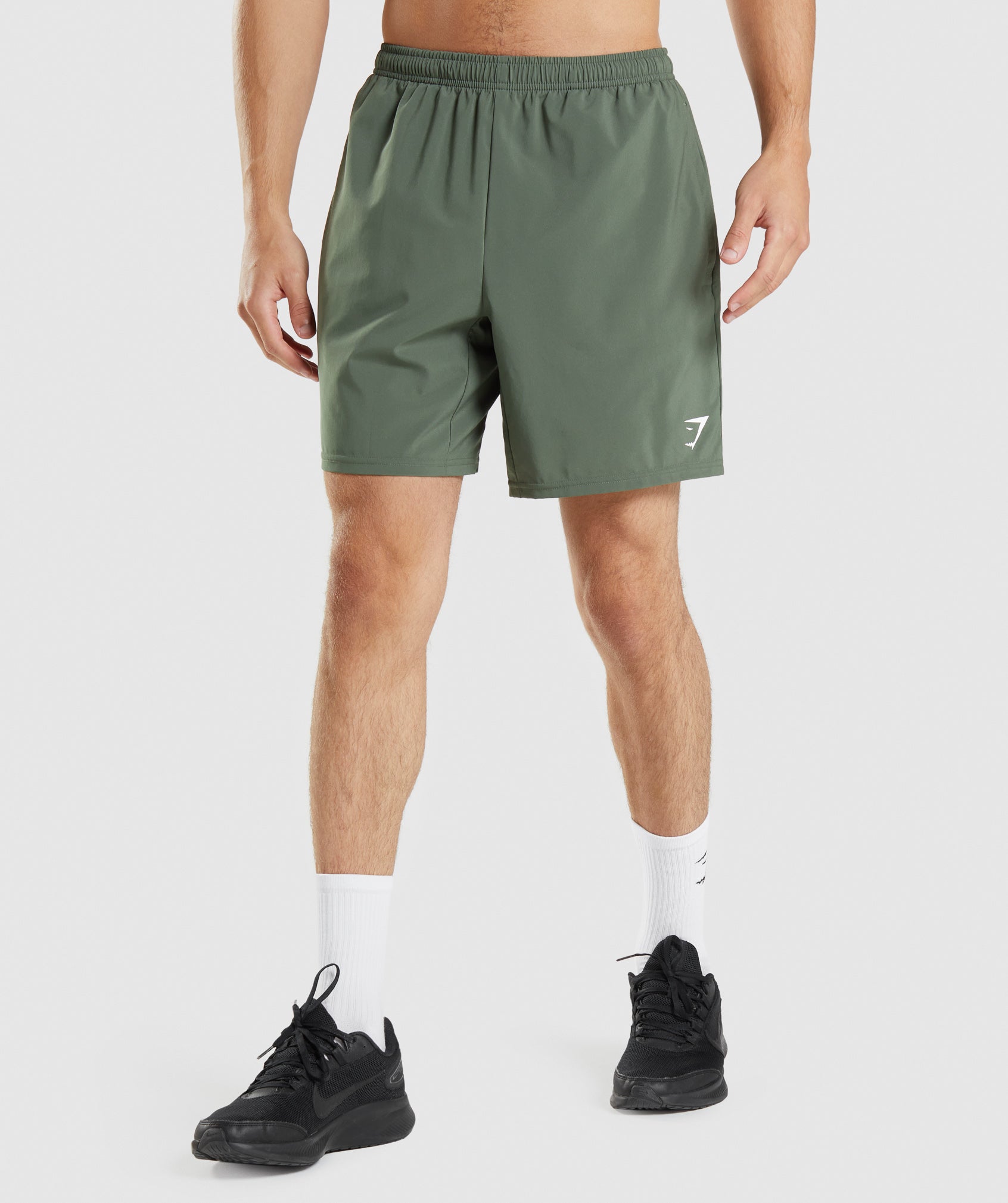 Green Men's Gymshark Arrival 7" Shorts | NHOIQD-427