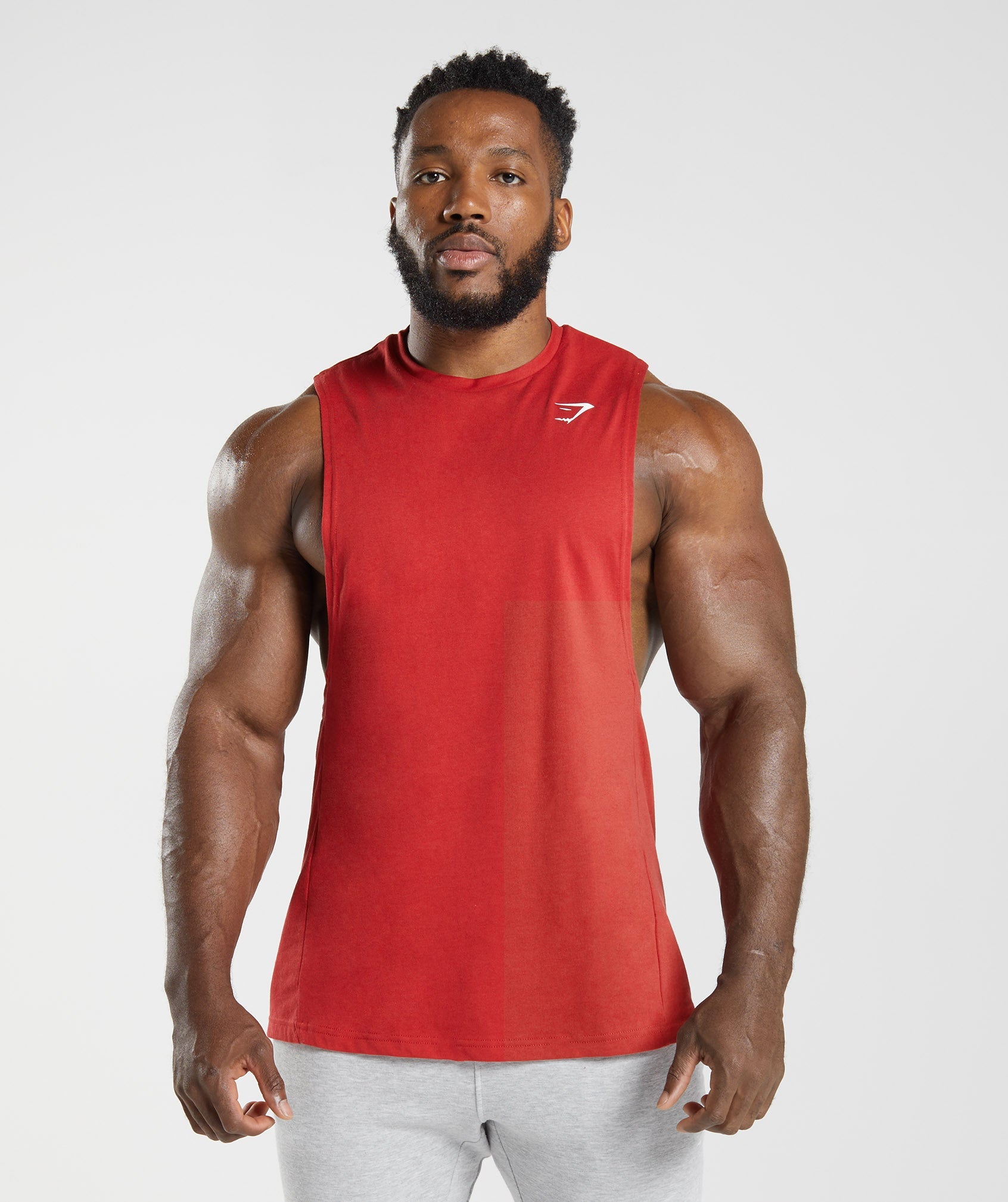 Red Men's Gymshark React Drop Arm Tanks | JRBPKD-351