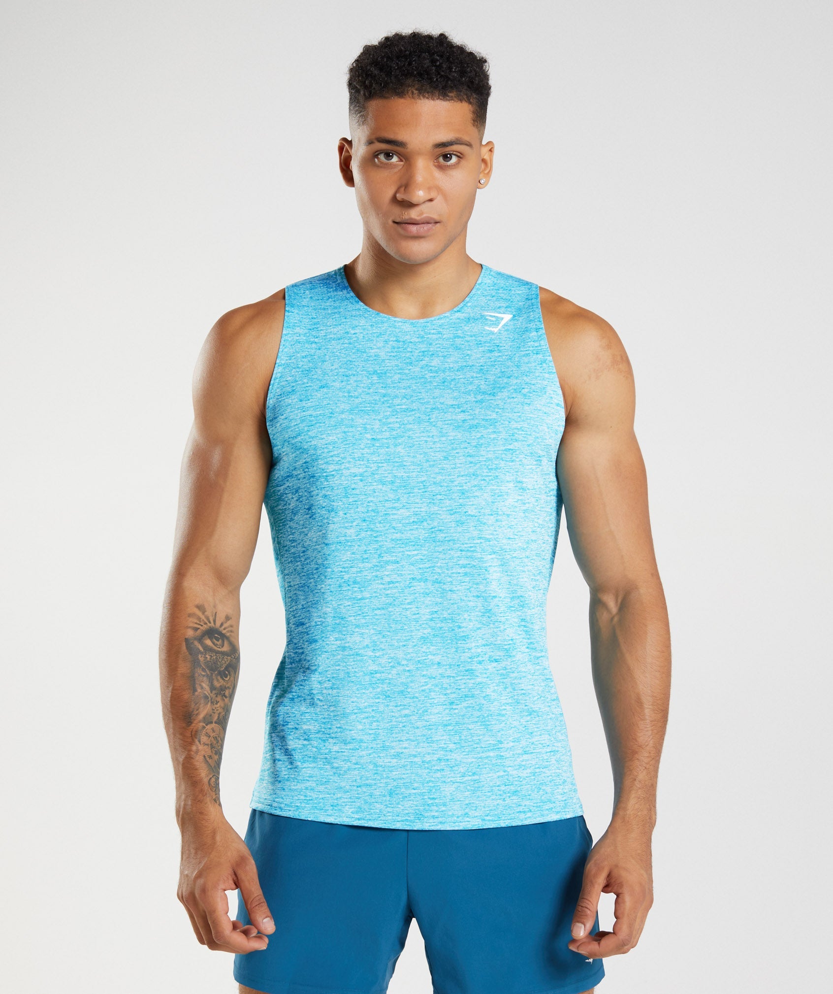 Turquoise Men's Gymshark Arrival Slim Marl Tanks | LYPFSM-923