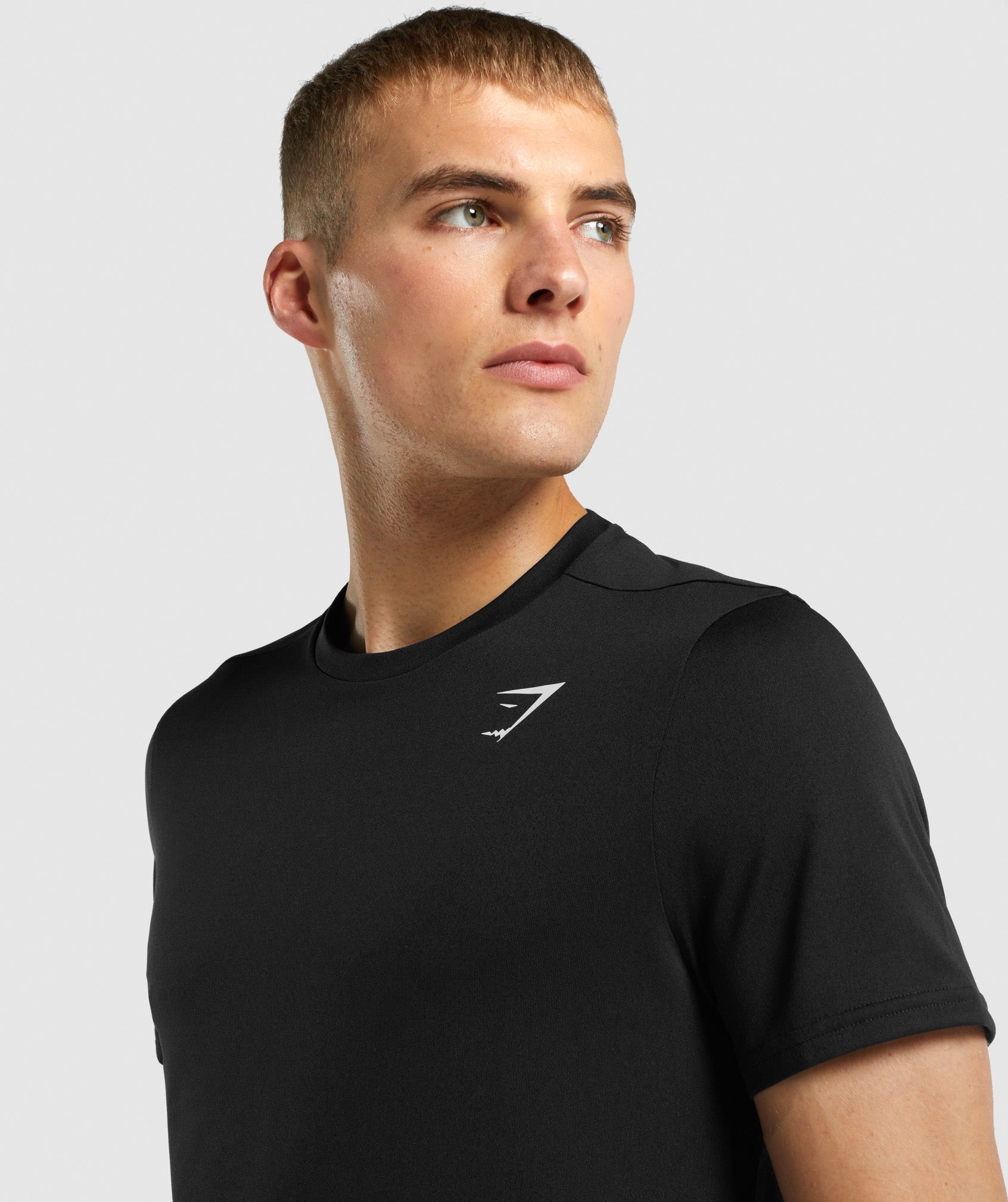 Black Men's Gymshark Arrival Regular Fit T Shirts | FTQHNW-972