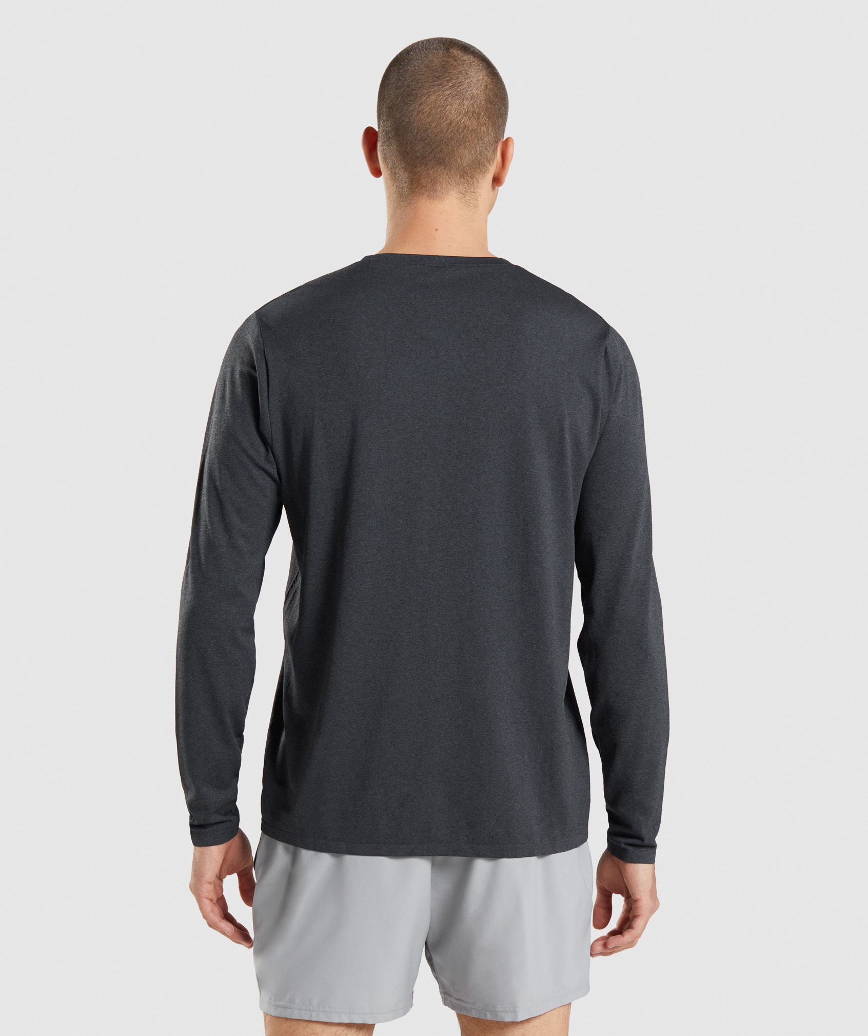 Black Men's Gymshark Arrival Seamless Long Sleeve T Shirts | RPACIO-539