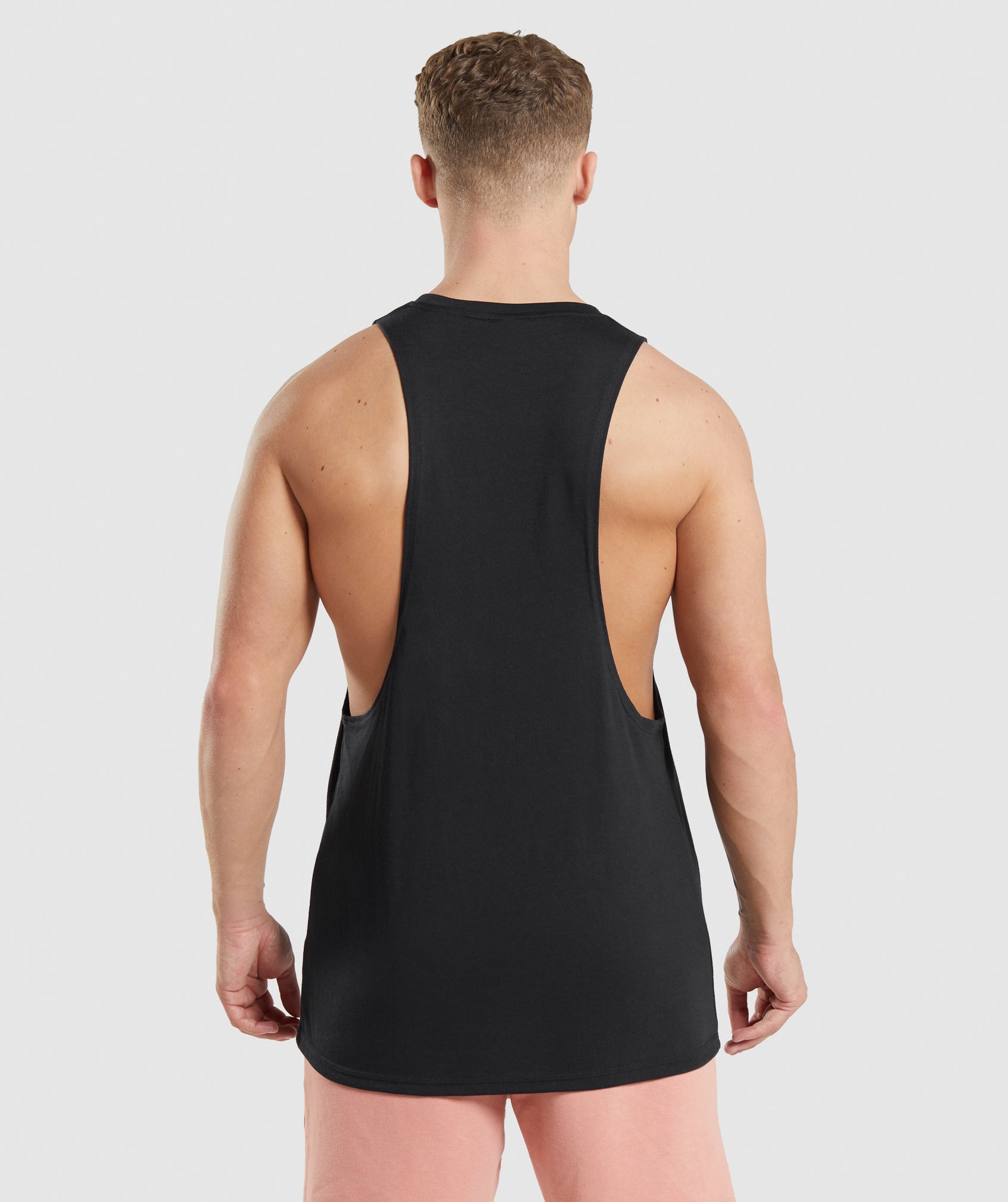 Black Men's Gymshark Legacy Drop Arm Tanks | LHCTAN-243