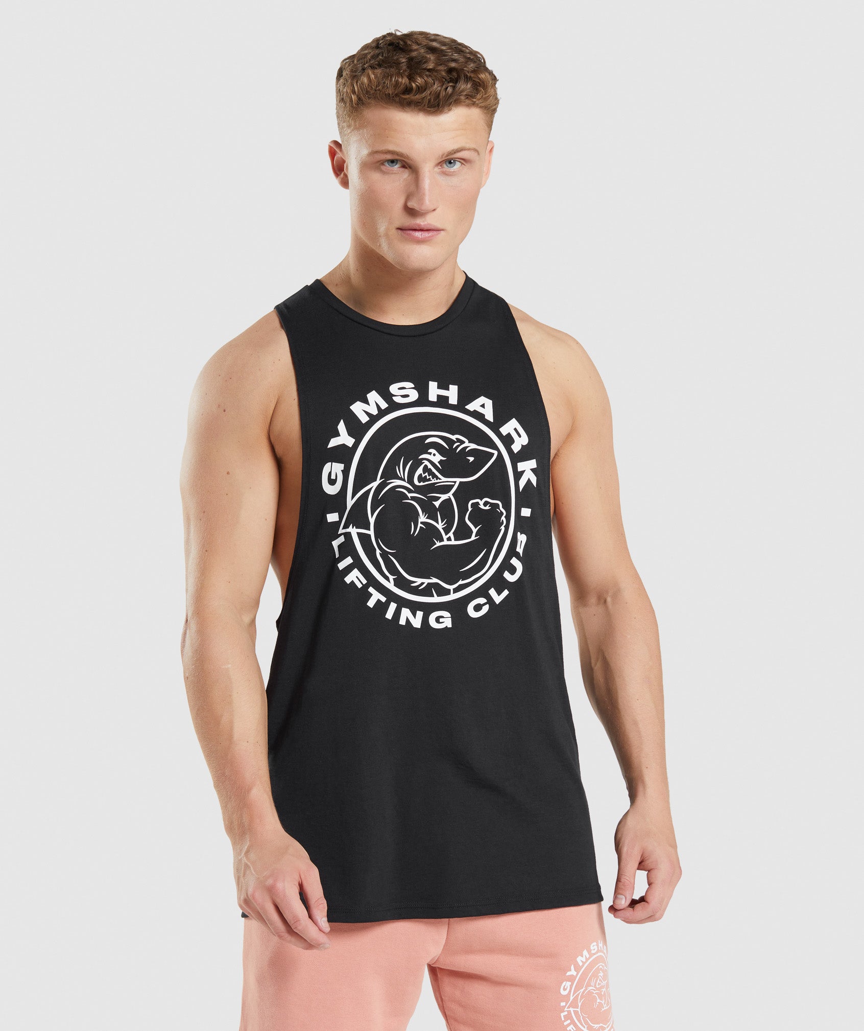 Black Men\'s Gymshark Legacy Drop Arm Tanks | LHCTAN-243