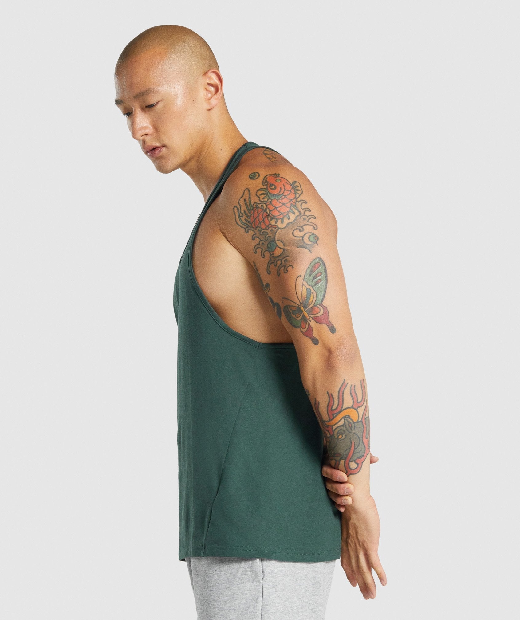 Dark Green Men's Gymshark Critical 2.0 Stringer Vest | JEKSYF-927