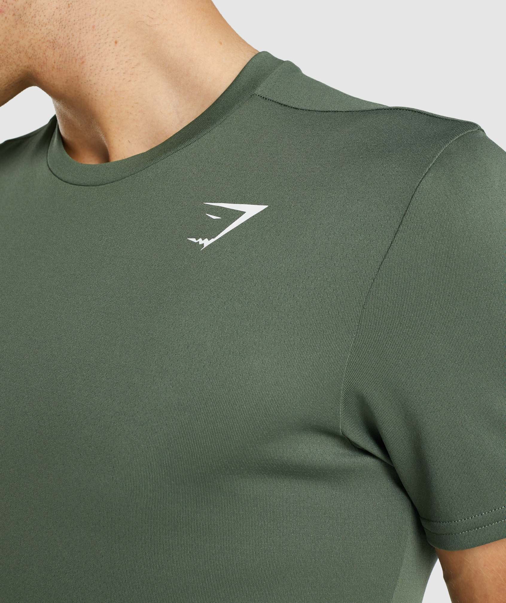 Green Men's Gymshark Arrival T Shirts | ZPXIRW-753