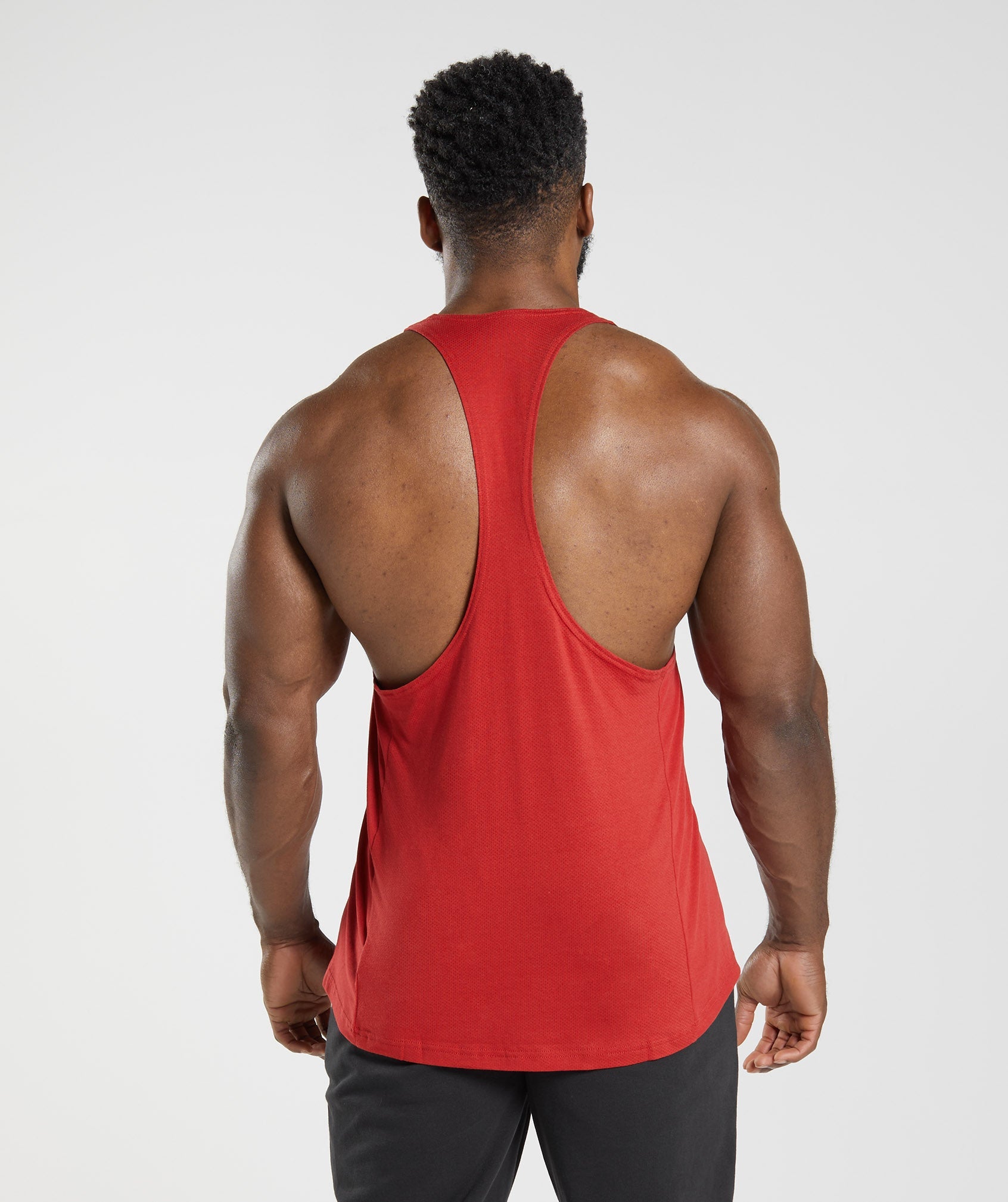 Red Men's Gymshark React Stringer Vest | XWUPQD-793