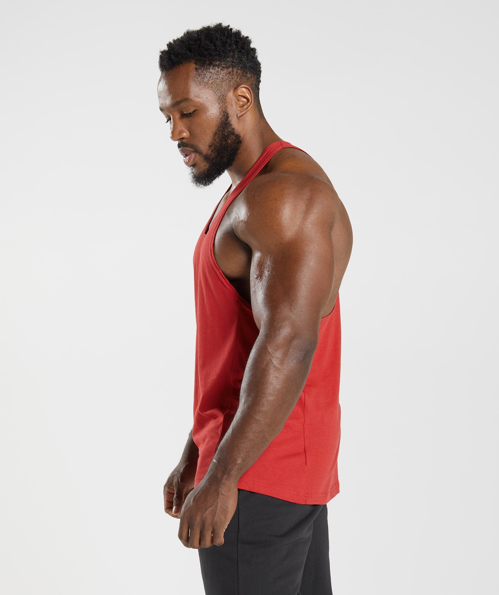 Red Men's Gymshark React Stringer Vest | XWUPQD-793