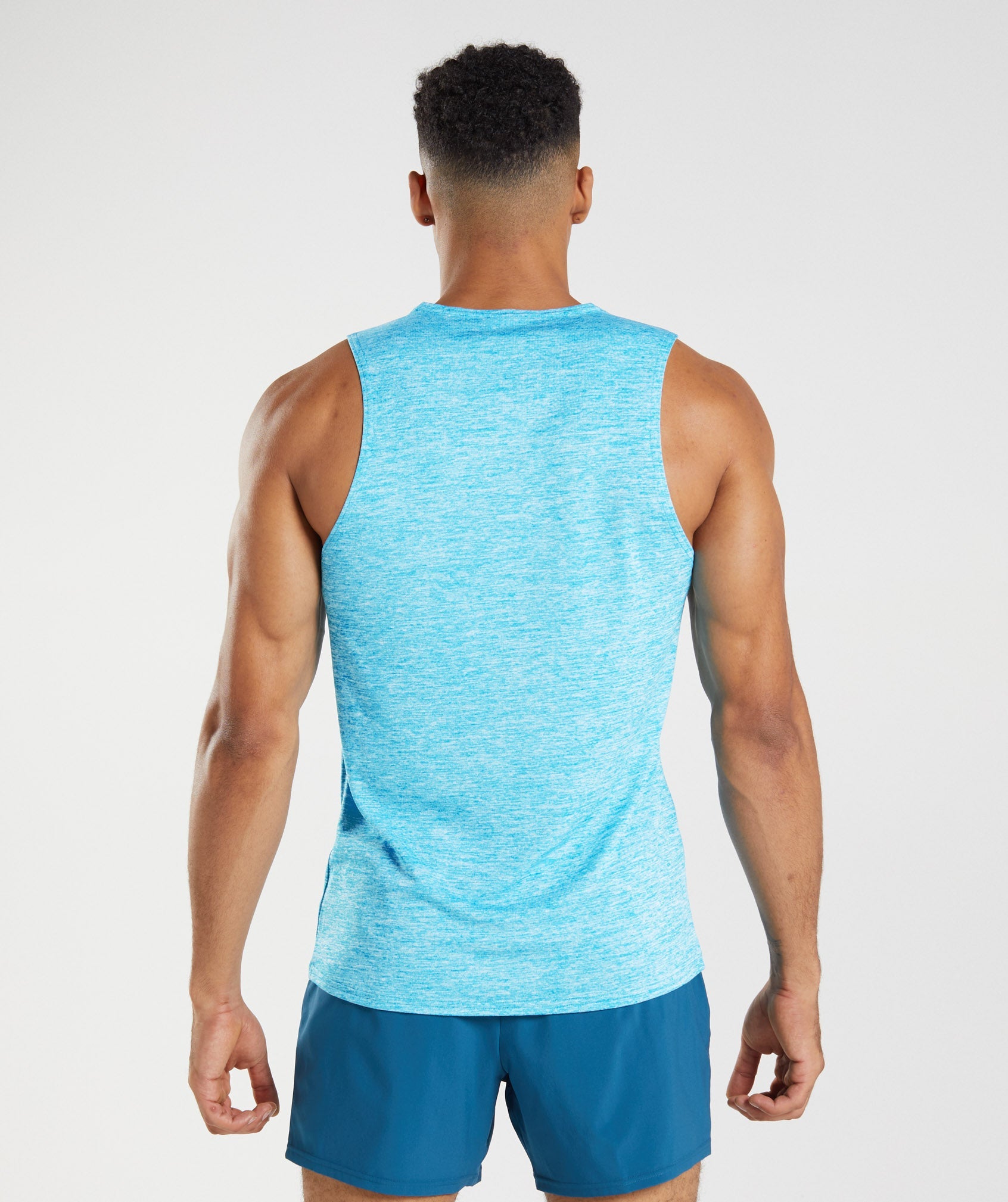 Turquoise Men's Gymshark Arrival Slim Marl Tanks | LYPFSM-923