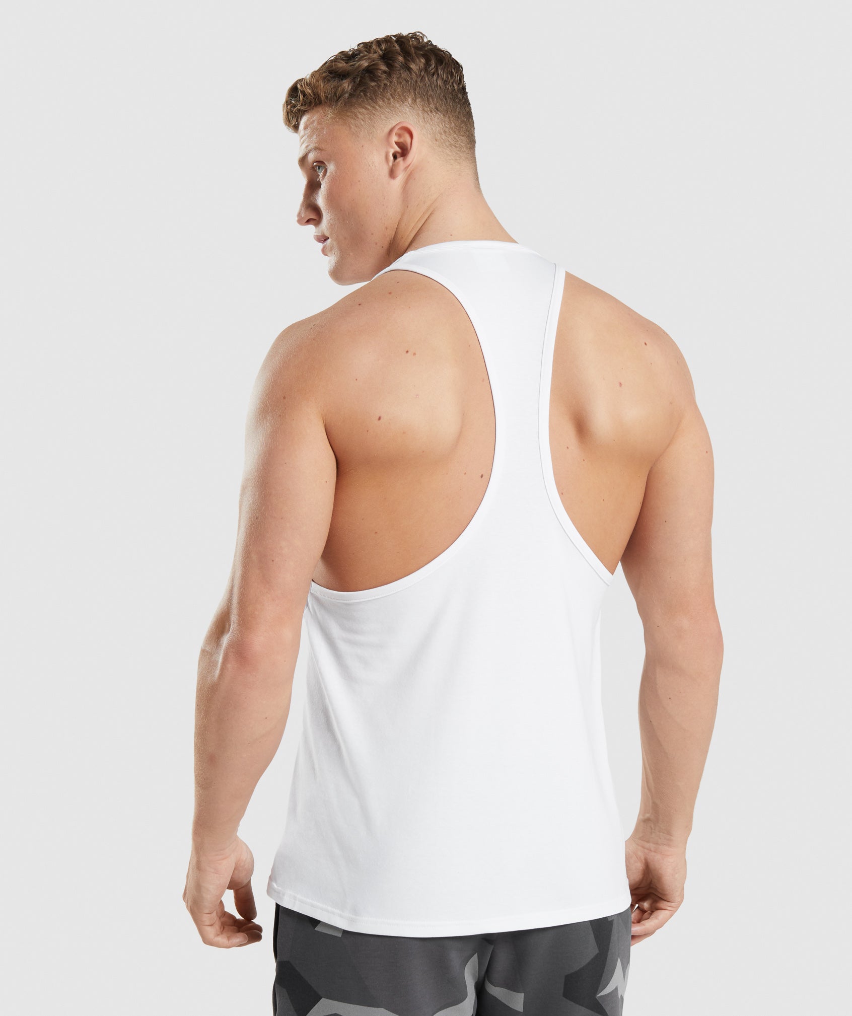 White Men's Gymshark Critical Stringer Vest | BGCAUI-149