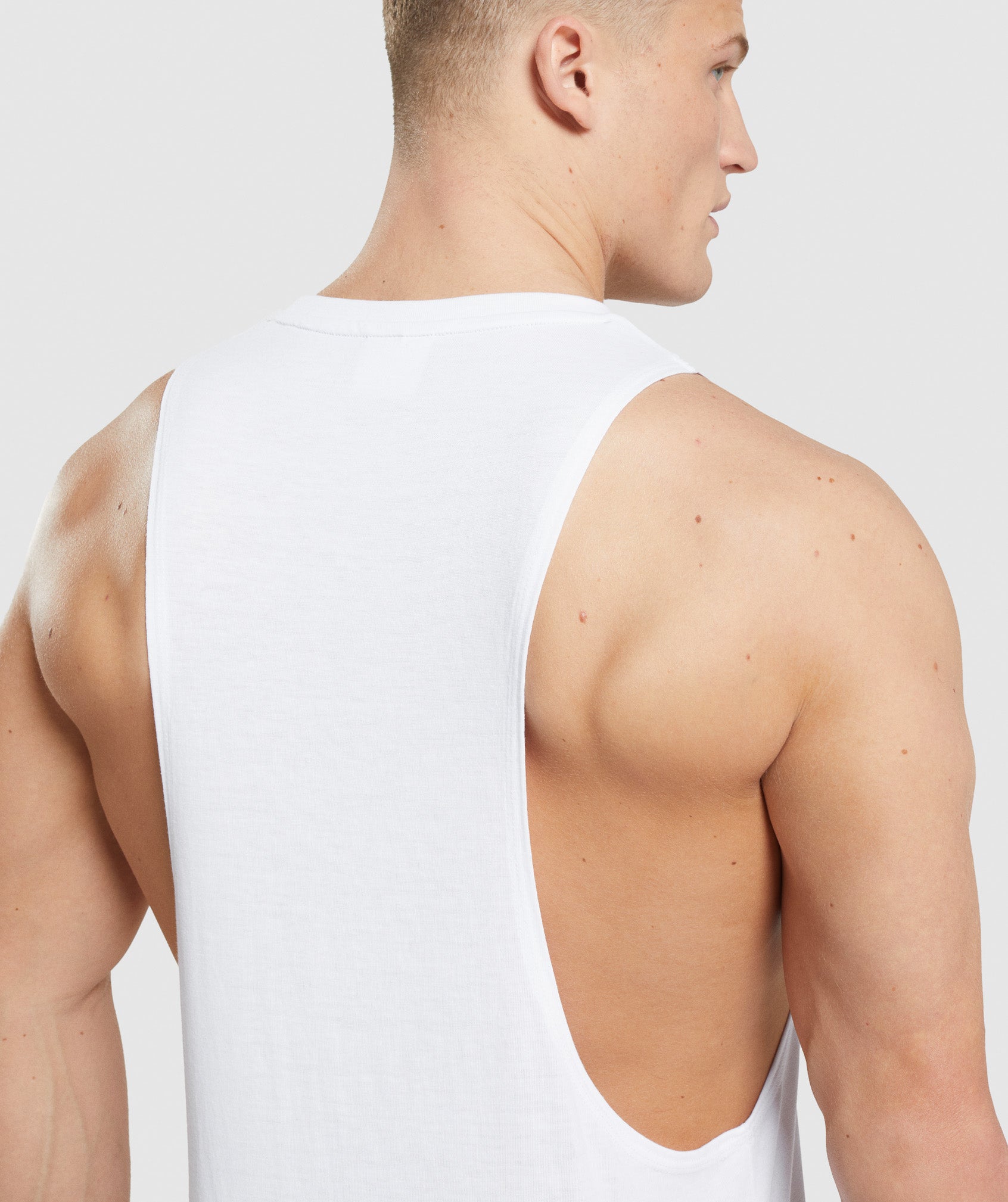 White Men's Gymshark Legacy Drop Arm Tanks | AYNBRD-347