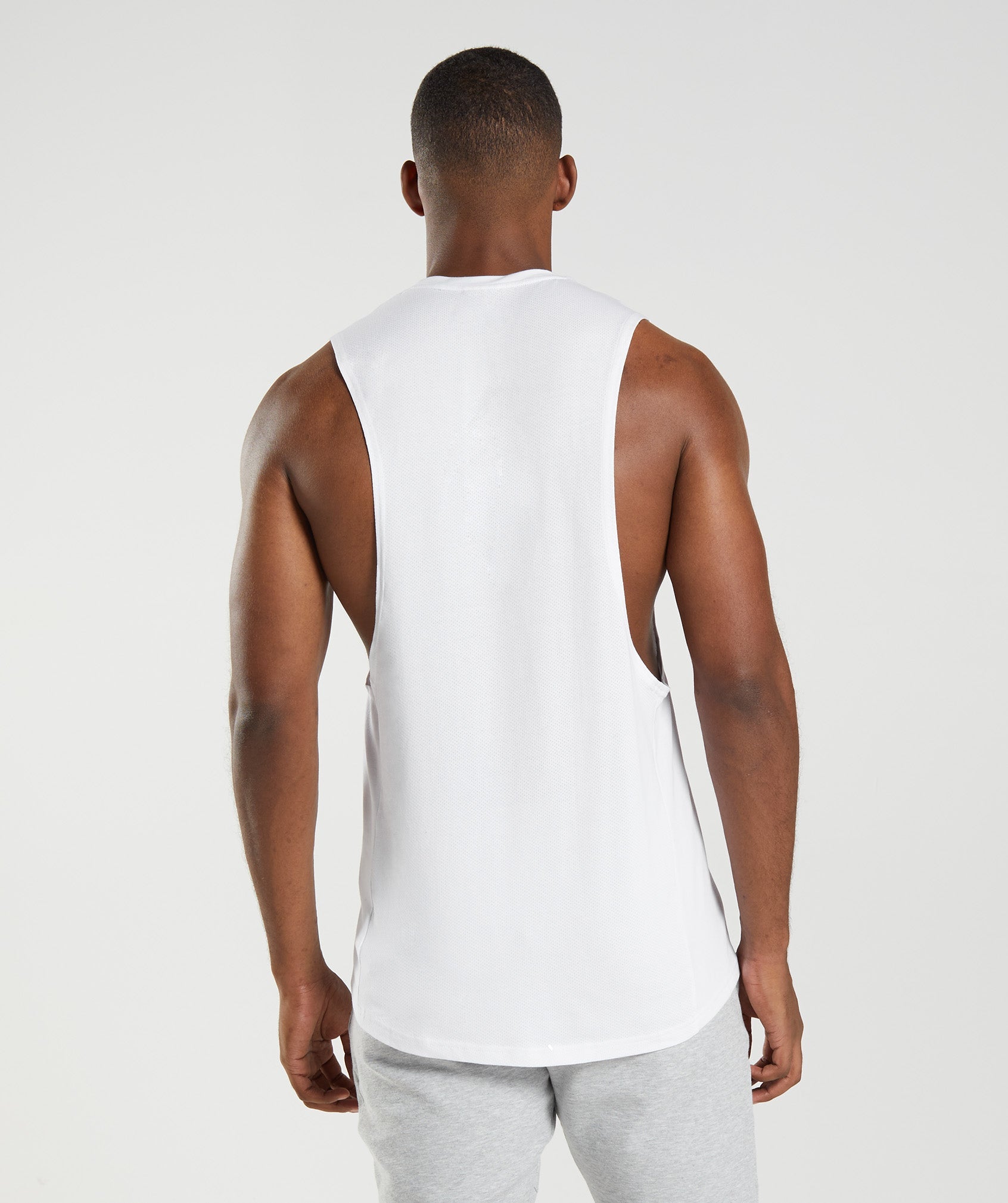 White Men's Gymshark React Drop Arm Tanks | JMEXLI-138