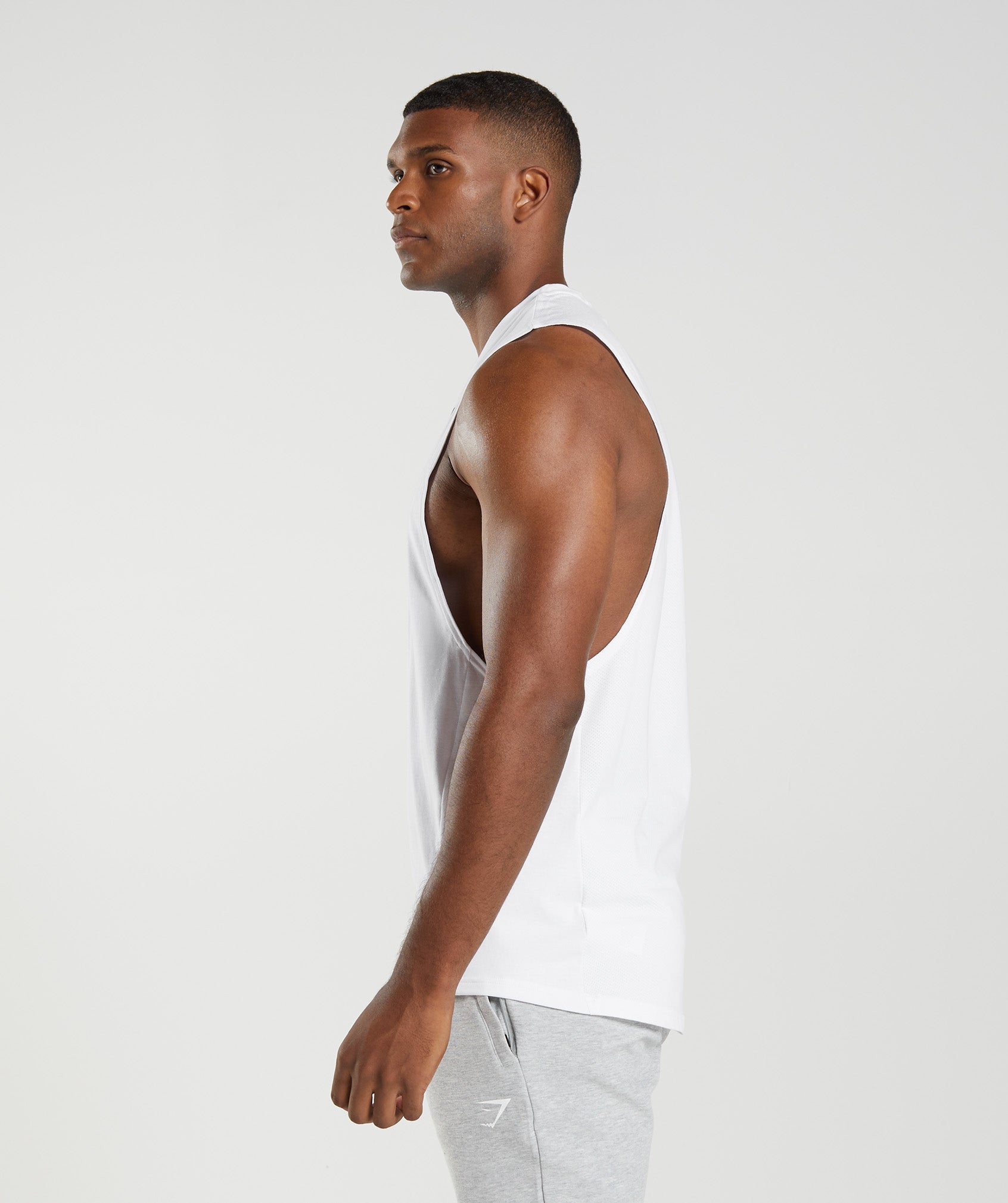 White Men's Gymshark React Drop Arm Tanks | JMEXLI-138